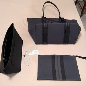 Rothy Navy tote with black stripes matching universal pouch and tote organizer.
